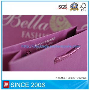 Лилава хартиена торба с вързана дръжка